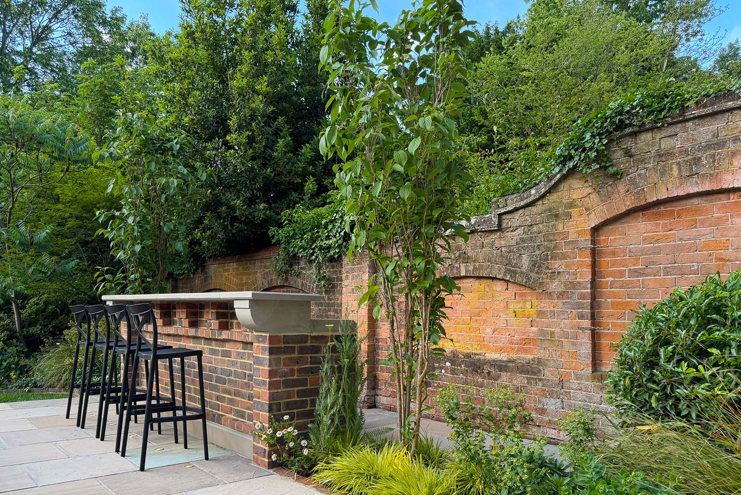A characterful Edwardian townhouse garden in Tonbridge, designed for relaxed family living and entertaining while respecting the architecture and heritage of the property.